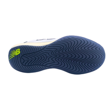 Sole a New Balance ladies pickleball shoe. Suitable for tennis, pickleball and netball. Has a white mesh upper with a pink N and Navy heel and sole.