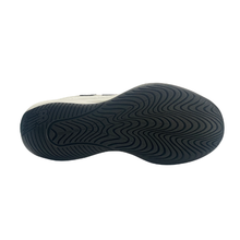 Sole of a New Balance men's court shoe. Suitable for tennis, pickleball and netball. Has a white mesh upper with a black sole.