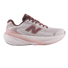 Side view of the pink salt and pebble new balance 680 ladies sneaker with a soft pink stability bar and a burgundy tongue and lace. 