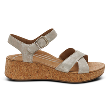 An Aetrex Flora cork veneer wedge sandal in Champagne suede leather with arch support and rubber sole.