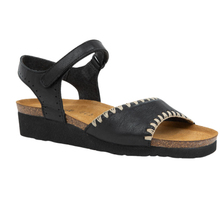 A single black leather wedge sandal with an adjustable ankle strap, a supportive cork midsole, and decorative beige stitching along the toe strap 
