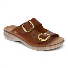 The Florence 2 by Revere an orthotic friendly slide with velcro extendable straps. Pictured in tan with gold hardware and a cream sole.