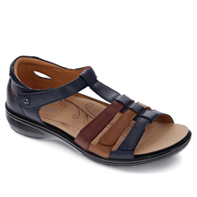 The Revere Seville, a Navy ladies velcro adjustable sandal with cognac and tan straps. Orthotic friendly, it includes a removable arch supportive insole. Leather upper and lining. Enclosed heel for added support.