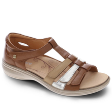 The Revere Seville, a tan ladies velcro adjustable sandal with nude and silver straps. Orthotic friendly, it includes a removable arch supportive insole. Leather upper and lining. Enclosed heel for added support.