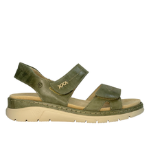 Suave Monty. An olive green open-toe slingback sandal with two adjustable straps and a beige footbed and sole, made in Portugal.