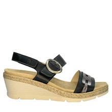 A black and taupe women's wedge espadrille look sandal with a metallic silver buckle on the ankle strap and a decorative chain-link pattern on the toe strap.