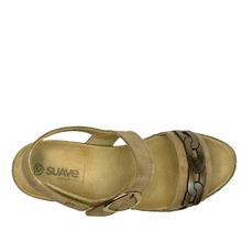 A sandy taupe women's wedge espadrille look sandal with a metallic gold buckle on the ankle strap and a decorative chain-link pattern on the toe 